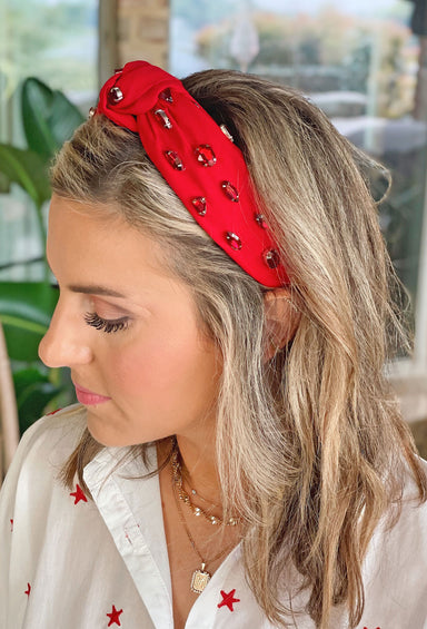 Macey Rhinestone Headband in Red, Headband that features a red knot design and sparkling pink rhinestones