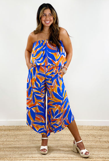 Paradise Dreaming Jumpsuit, strapless abstract jumpsuit, high low leg detail