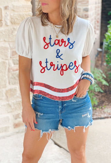 Stars & Stripes Sequin Top, Short sleeve top that features puff sleeves with patriotic red and white sequin stripes on the bottom