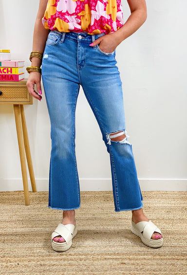 Bella High-Rise Flare in Medium Wash, medium wash flare jeans, hole at the knee