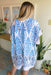 Daydreams Damask Printed Kimono in Blue, white kimono with a blue damask print, tassels hanging from bottom 