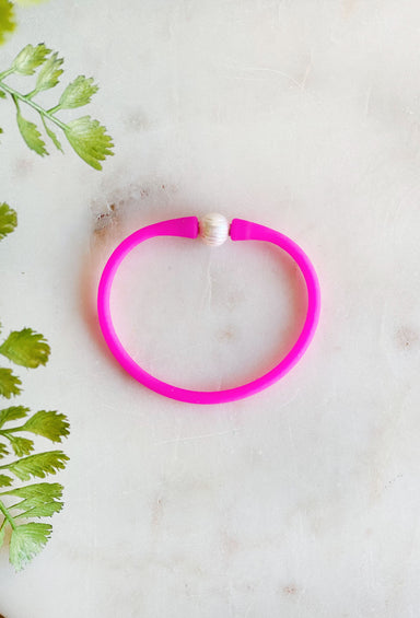 Hidden Treasure Bracelet in Fuchsia, rubber bracelet with pearl detail