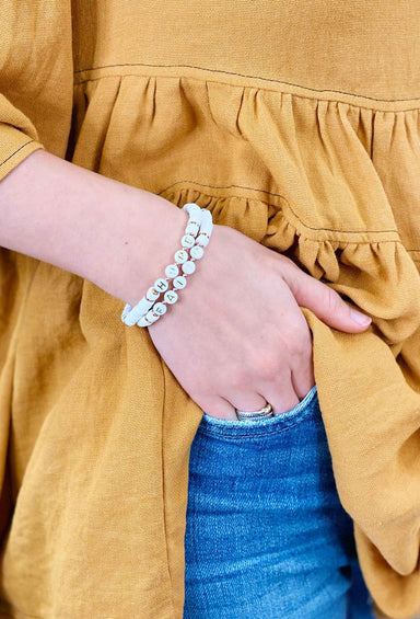 Hope & Faith Stretch Bracelets white vinyl bead bracelets with white alphabet beads