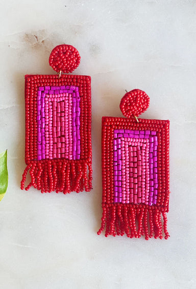 Kirby Beaded Earrings in Red, red and pink beaded earrings in a rectangle shape with beaded fringe