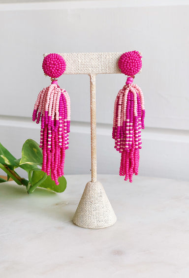 Rylee Beaded Tassel Earrings in Pink, shades of pink beads, hanging in a tassel 