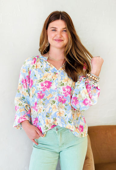 Settle Into Spring Floral Top, right blue button up top with pink and yellow flowers
