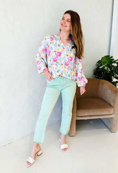 Settle Into Spring Floral Top, right blue button up top with pink and yellow flowers