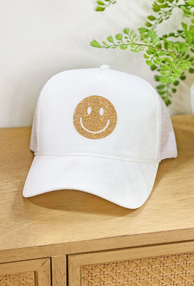 Smiles For Miles Trucker Hat in white, white trucker hat with gold smiley face