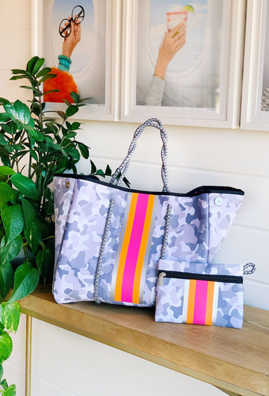 The Olivia Neoprene Tote, light grey camo print neoprene tote with hot pink and orange stripe detailing down the front 