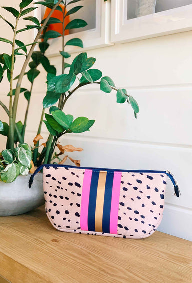 The Christi Exotic Neoprene Small Cosmetic, pink antelope bag with hot pink gold and navy stripe
