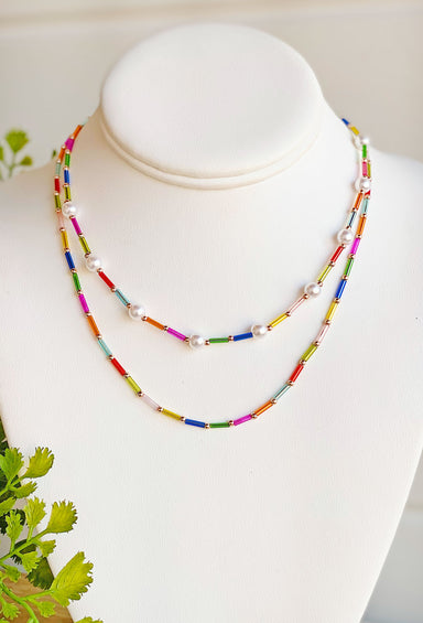 Ticket To Paradise Necklace, layered necklace with multi colored beads separated by pearls and gold beads