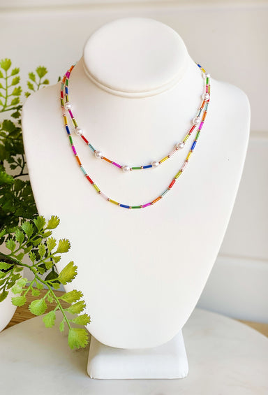 Ticket To Paradise Necklace, layered necklace with multi colored beads separated by pearls and gold beads