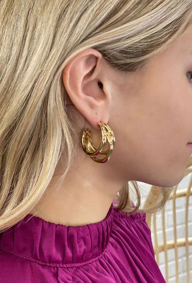 Trinity Gold Loop Earrings, shiny gold finish, three hoops that meet at the stud