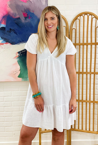 Vacation Mode Linen Dress, babydoll style body, v-neck with a tiered bottom, white linen material