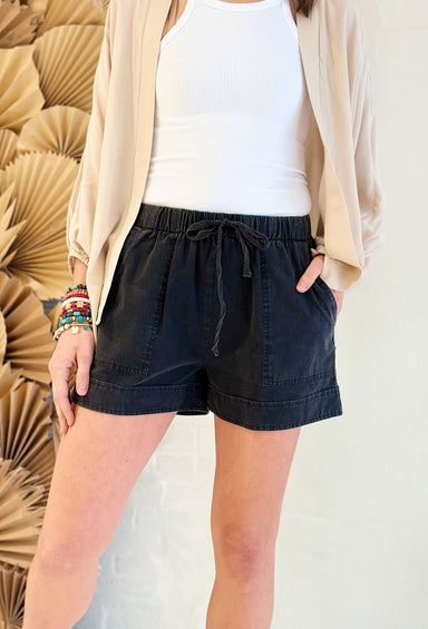 Warmer Days Shorts in Ash, washed black shorts, with elastic waistband, self tie detail