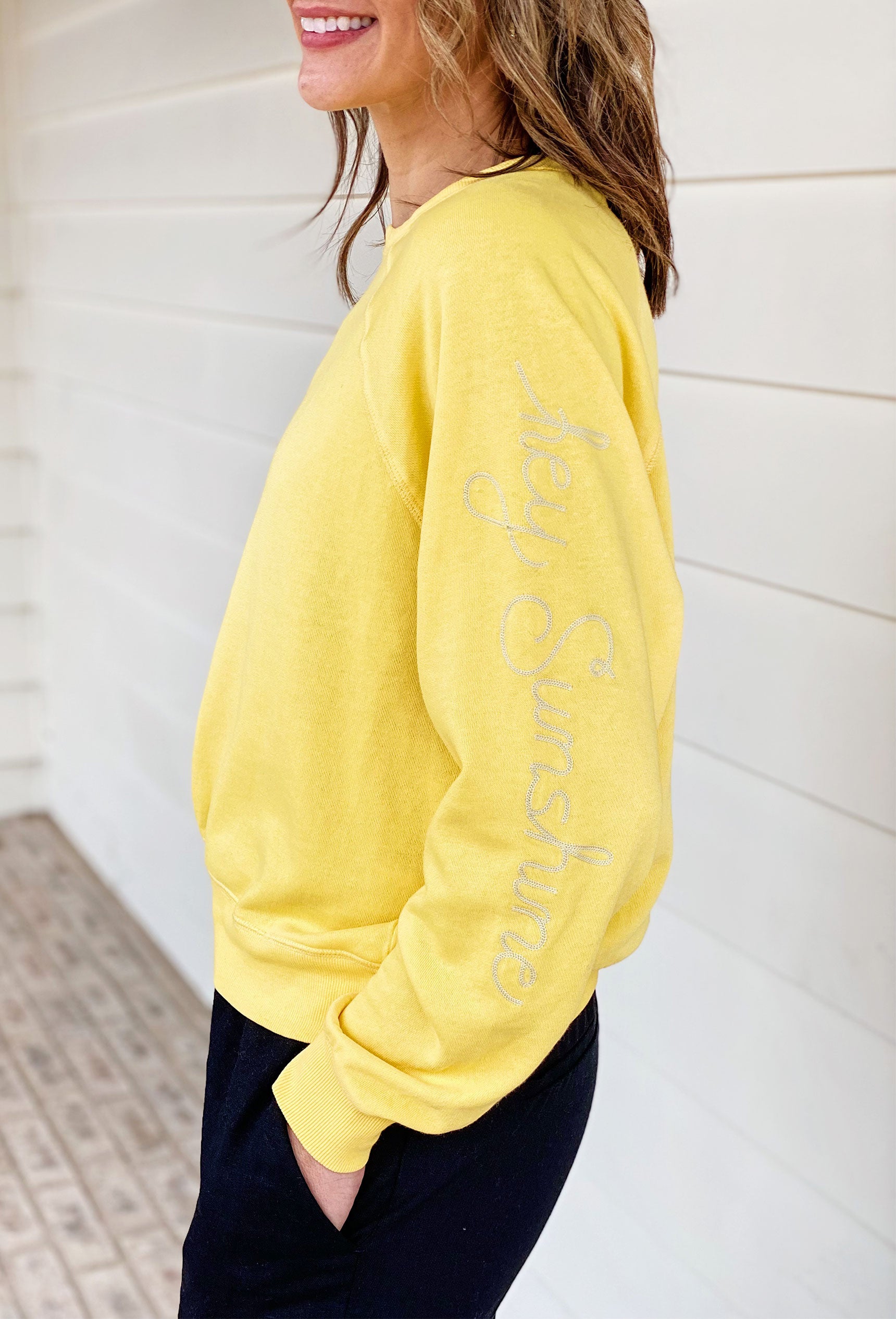 Z SUPPLY Vintage Statement Sweatshirt in Bright Sun, pullover with embroidered wording on the sleeve, embroidered sun detailing on the opposite sleeve