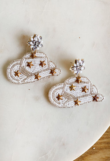 Rhinestone Cowgirl Beaded Earrings in White, white beaded earrings in the shape of a cowgirl hat with gold star beads