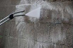 Demonstrating graffiti removal from concrete walls with Taginator