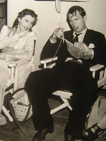 Barbara Stanwyck and Gary Cooper knitting on set of "Meet John Doe"