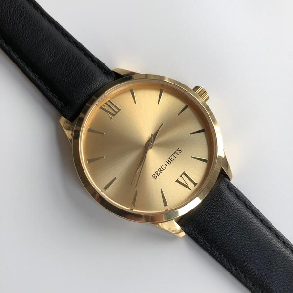 black leather strap gold face watch