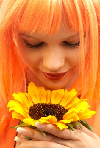 Girl Appreciating a Sunflower- ISA Professional
