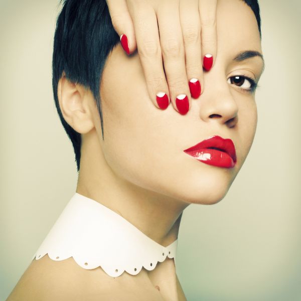 Girl Wearing Fire Red Nail and Lip Color ISA Professional