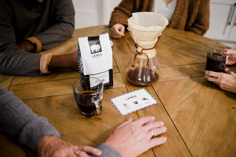 families enjoying lanna coffee around the kitchen table