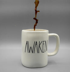 Coffee pouring into coffee mug