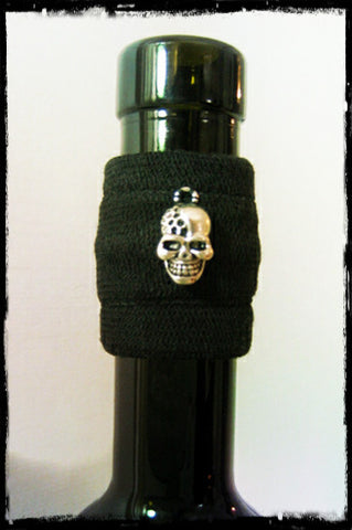 Wine accessory drip stopper band with edgey silver skull