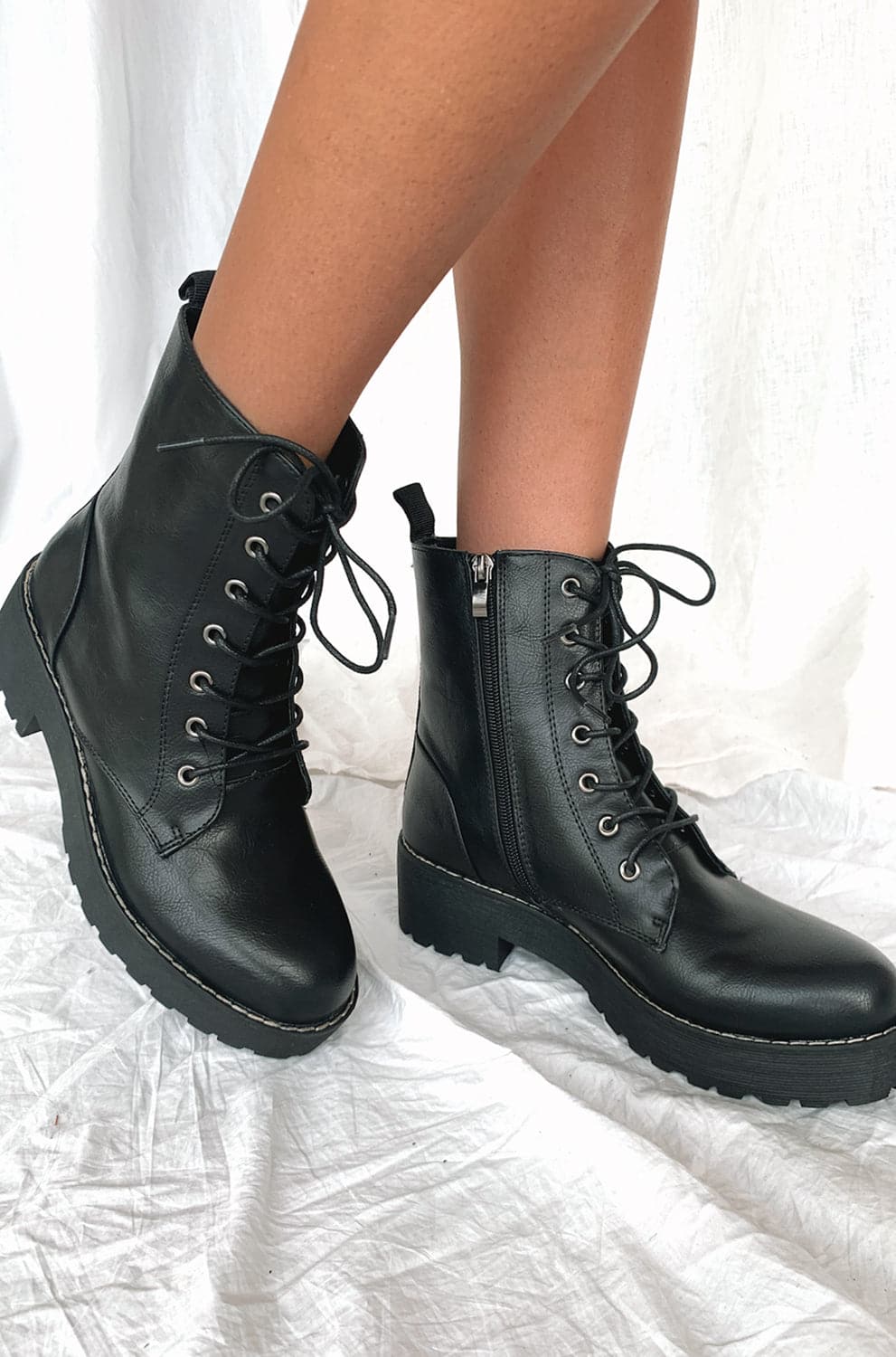 black combat boots with zipper