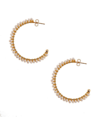 Gold pearl hoop earring