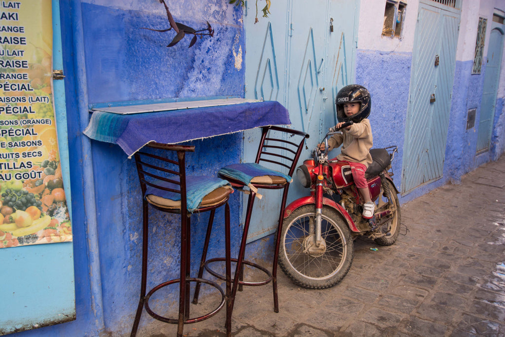 Street Scenes in Chefchaouen, Morocco by Sophee Smiles - Boys on Motorbike