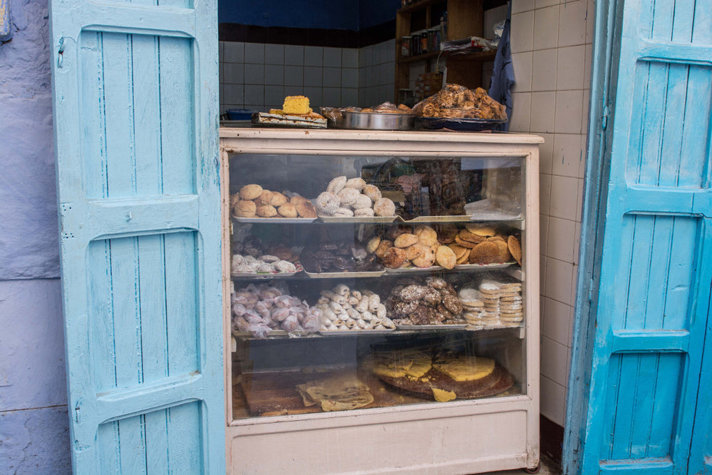 Street Scenes in Chefchaouen, Morocco by Sophee Smiles - Pastries in Counter