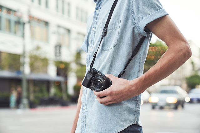 Sony a6100 on shoulder strap