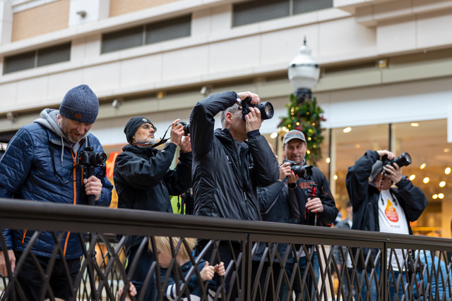 group of photographers taking photos of the holiday shoppers at city creek 