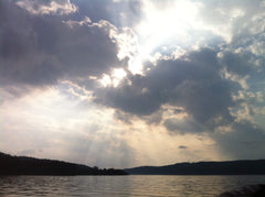 Sun rays over lake