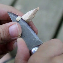 pocket knives cut wood