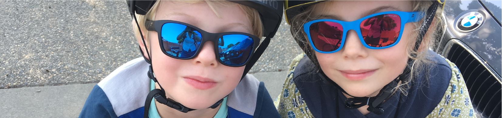 Photo of two of our staffer's children out on a family bike ride.