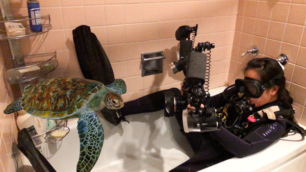 Jen in her scuba gear in her bathtub