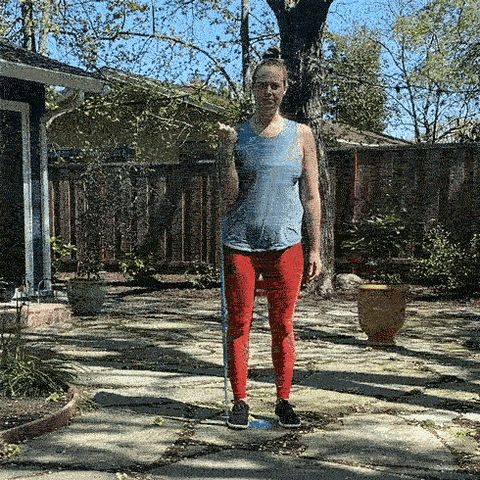 Animated gif of Breanna demonstrating the Bicep Curl exercise