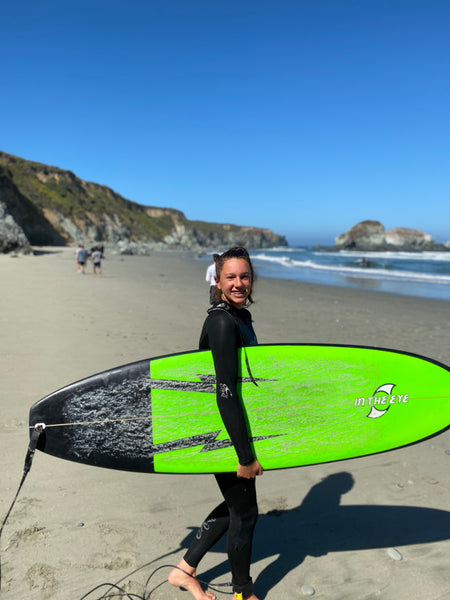 Dave's daughter with her surfboard