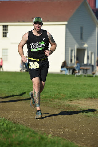 Austen running in the Presidio at the end of the race.