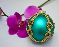 green gold beaded christmas ball