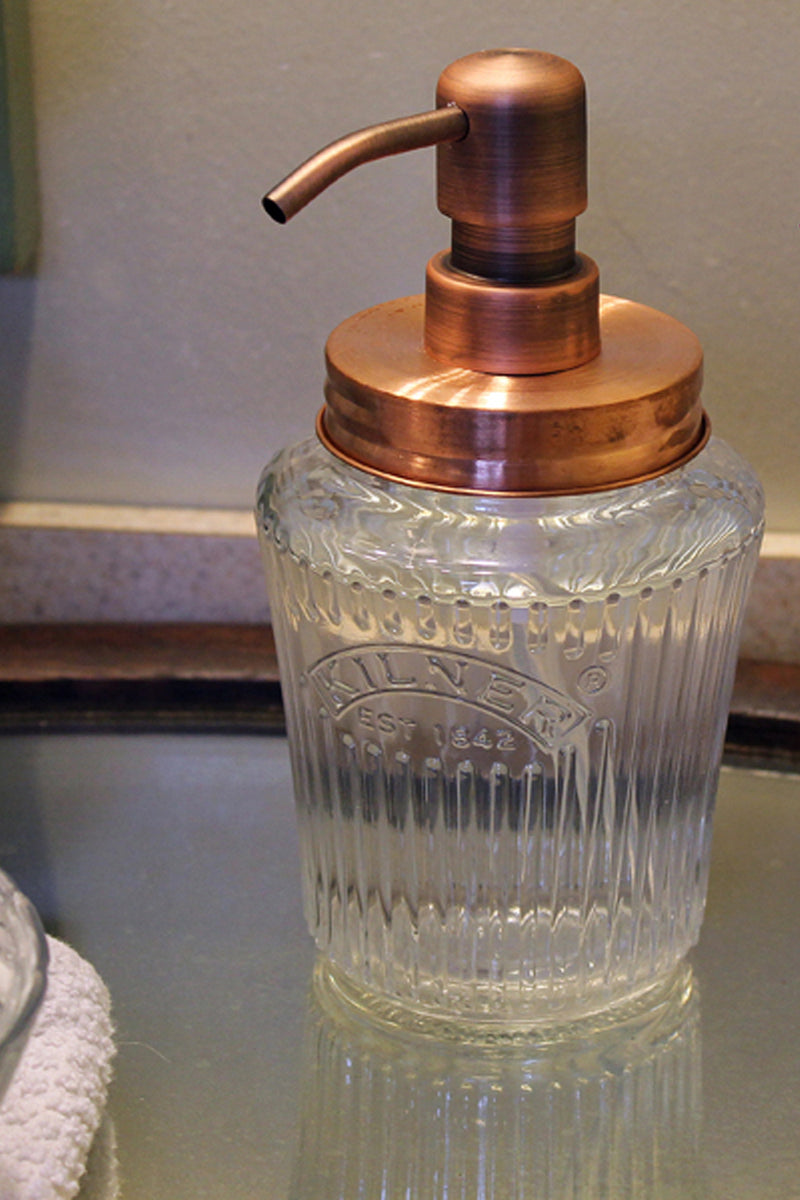 antique soap dispenser