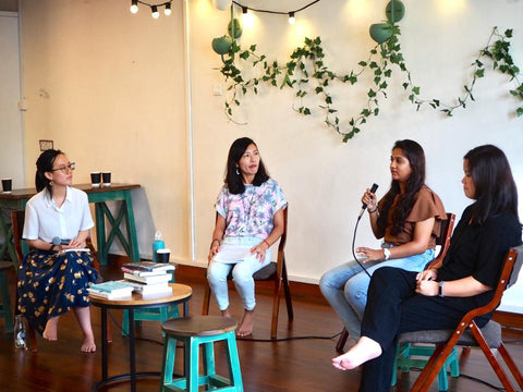 Photo of the four panelists from sitting in a semi circle, from left to right: Jennifer, Esther, Komal, Melissa