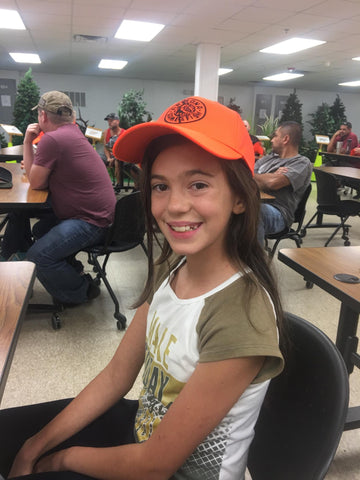 My daughter sitting for her hunter safety course