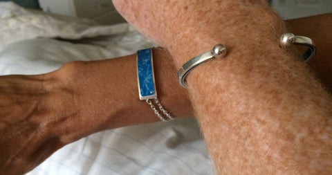 Clients wearing their Larkspur bracelet and bangle