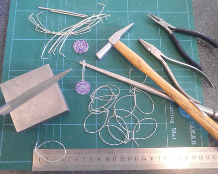 Components to make earrings with tools