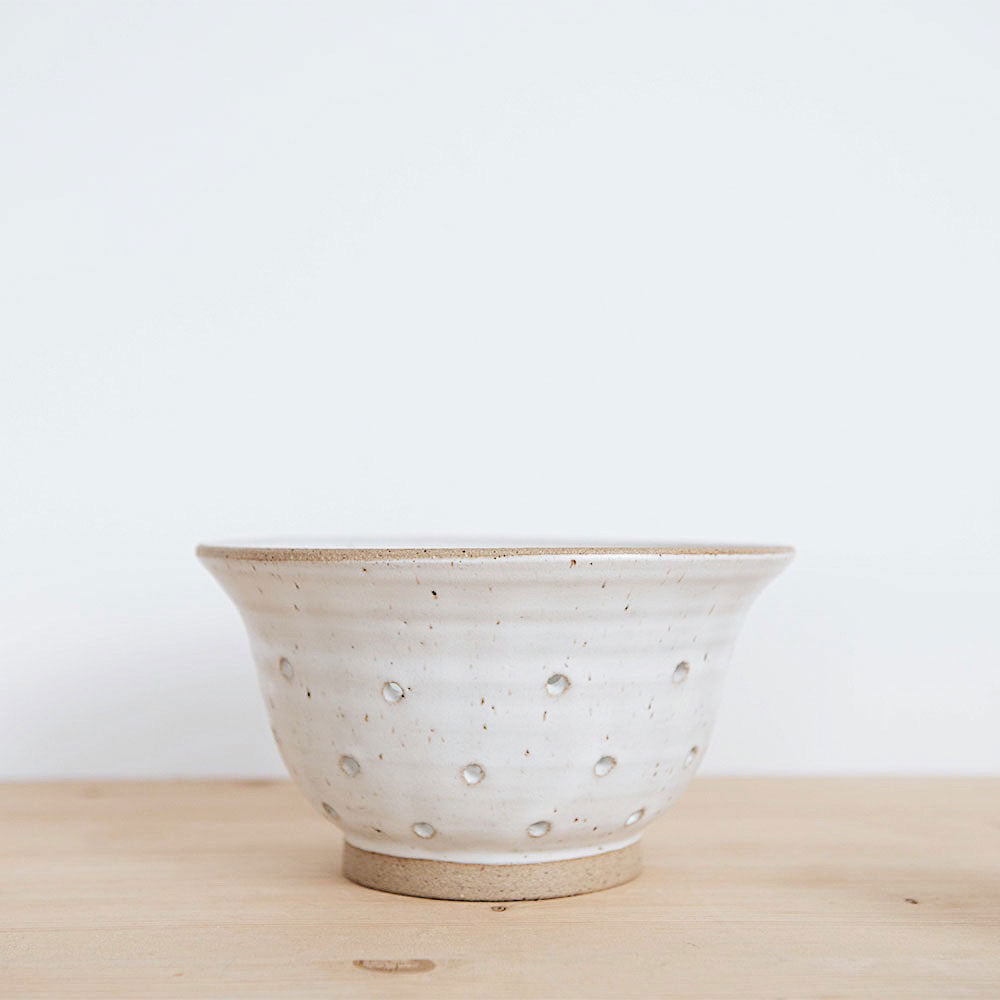 white ceramic berry bowl