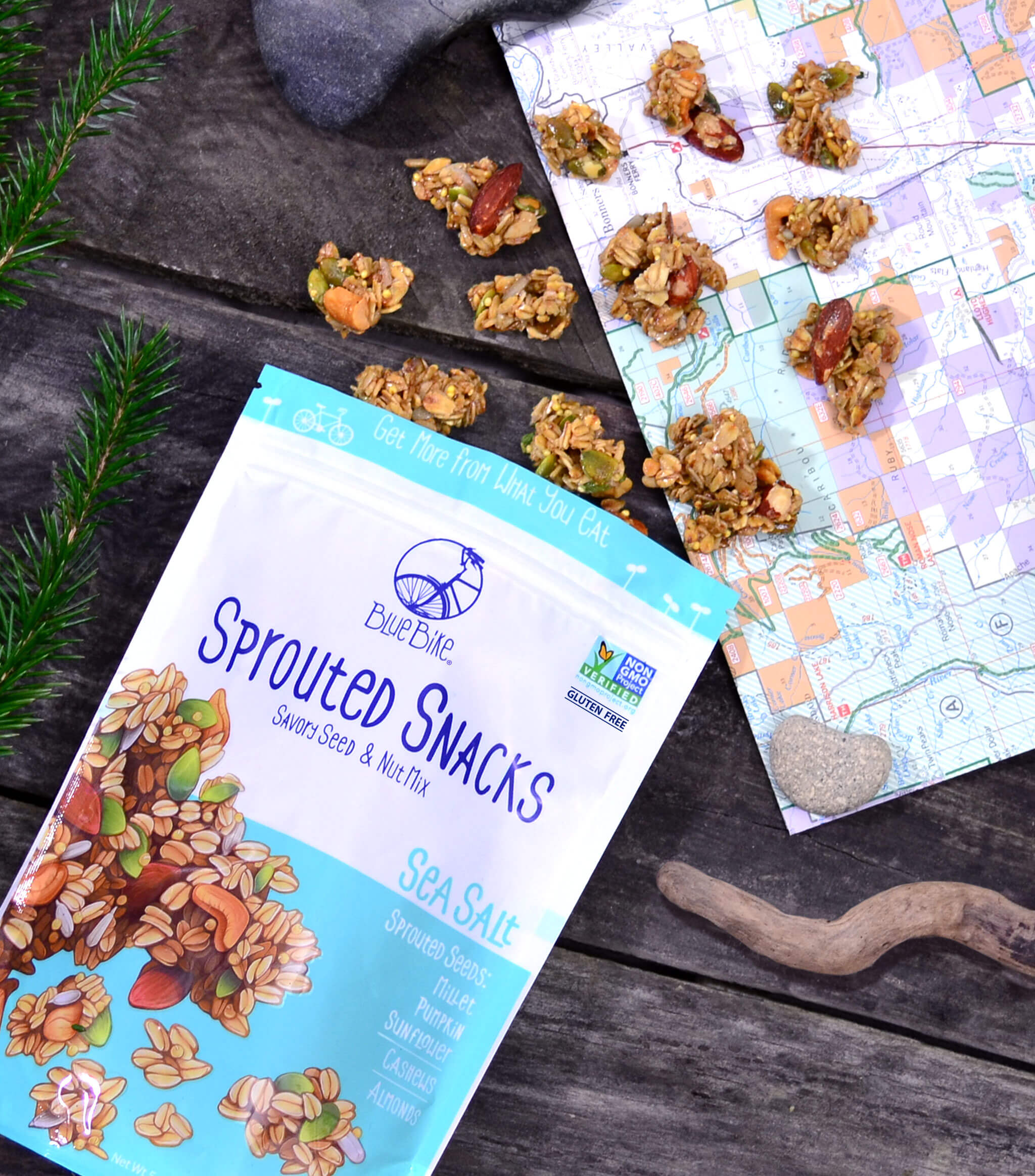 Sea Salt Sprouted Snacks falling onto hiking map